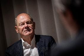 OLAF SCHOLZ