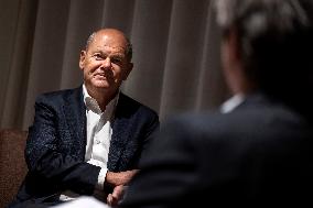 OLAF SCHOLZ