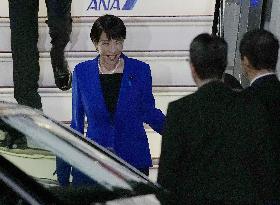 Japan PM Takaichi returns home
