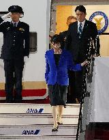 Japan PM Takaichi returns home