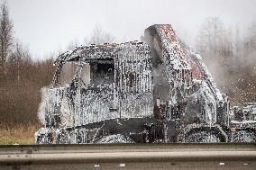 Burning truck on motorway
