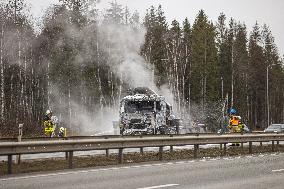 Burning truck on motorway