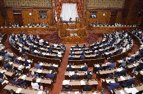 Japan parliament enacts law to scrap gasoline tax surcharge