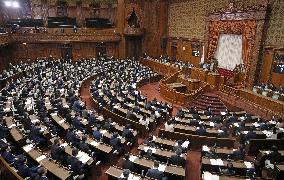 Japan parliament enacts law to scrap gasoline tax surcharge