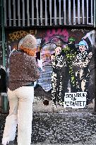 Provocative Wall Art Depicting Thunberg and Albanese with a Hamas Militant - Milan