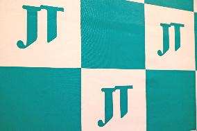 JT (Japan Tobacco Industries) signboard and logo