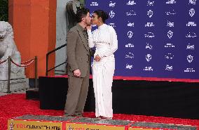 Jonas Brothers Hand And Footprint In Cement Ceremony - LA