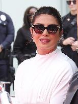 Jonas Brothers Hand And Footprint In Cement Ceremony - LA