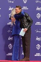 Jonas Brothers Hand And Footprint In Cement Ceremony - LA