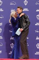 Jonas Brothers Hand And Footprint In Cement Ceremony - LA