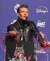 Jonas Brothers Hand And Footprint In Cement Ceremony - LA