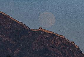 A Full Moon Over a Mountain - China