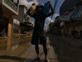 Death Toll From Devastating Floods Passes 900 - Indonesia