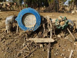 Death Toll From Devastating Floods Passes 900 - Indonesia