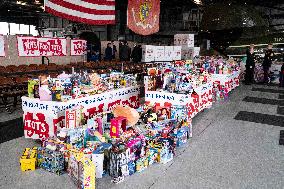 Melania Trump Participates in a Fundraiser for Toys for Tots