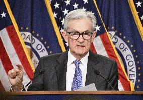 Fed cuts key rate by 0.25 point