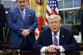 US President Donald J. Trump delivers remarks during a signing ceremony in the Oval Office