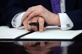 US President Donald J. Trump delivers remarks during a signing ceremony in the Oval Office