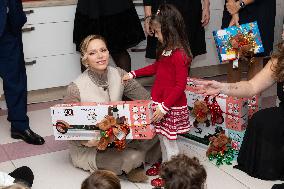 NO TABLOIDS - Christmas Gifts Distribution at Monaco Ree Cross Nursery