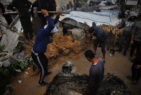 Search and Rescue Efforts Continue After Building Collapse - Gaza