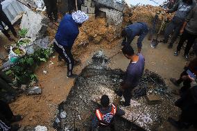 Search and Rescue Efforts Continue After Building Collapse - Gaza