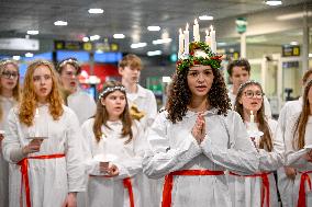 LUCIA PROCESSION AT COMMUTER TRAIN STATION