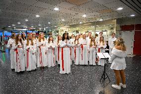 LUCIA PROCESSION AT COMMUTER TRAIN STATION