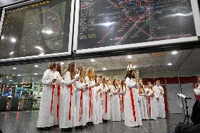 LUCIA PROCESSION AT COMMUTER TRAIN STATION