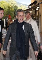 Nicolas Sarkozy And Son Leave Restaurant To Attend Book Signing - France