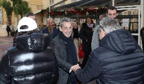 Nicolas Sarkozy And Son Leave Restaurant To Attend Book Signing - France