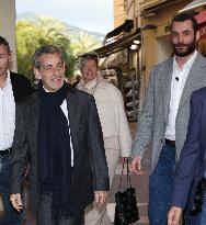 Nicolas Sarkozy And Son Leave Restaurant To Attend Book Signing - France