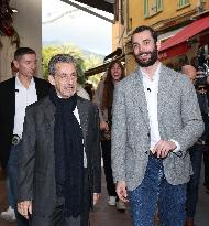 Nicolas Sarkozy And Son Leave Restaurant To Attend Book Signing - France