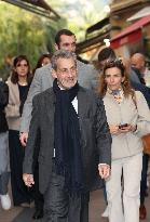 Nicolas Sarkozy And Son Leave Restaurant To Attend Book Signing - France