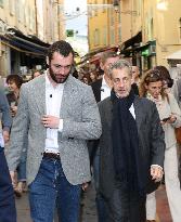 Nicolas Sarkozy And Son Leave Restaurant To Attend Book Signing - France