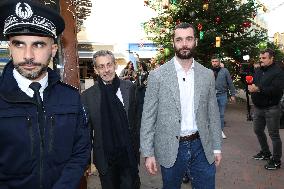 Nicolas Sarkozy And Son Leave Restaurant To Attend Book Signing - France