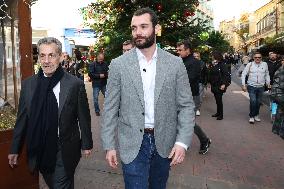 Nicolas Sarkozy And Son Leave Restaurant To Attend Book Signing - France