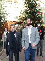 Nicolas Sarkozy And Son Leave Restaurant To Attend Book Signing - France