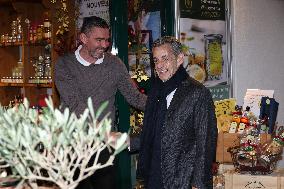 Nicolas Sarkozy And Son Leave Restaurant To Attend Book Signing - France