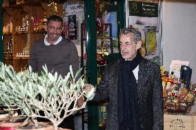 Nicolas Sarkozy And Son Leave Restaurant To Attend Book Signing - France