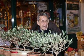 Nicolas Sarkozy And Son Leave Restaurant To Attend Book Signing - France