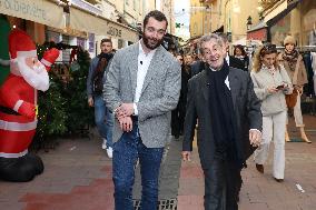 Nicolas Sarkozy And Son Leave Restaurant To Attend Book Signing - France