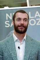 Nicolas and Louis Sarkozy At Public Book Signing - France