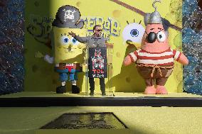 Spongebob Squarepants Places His Hand And Footprints In Cement - LA