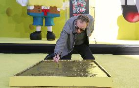 Spongebob Squarepants Places His Hand And Footprints In Cement - LA