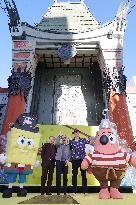 Spongebob Squarepants Places His Hand And Footprints In Cement - LA