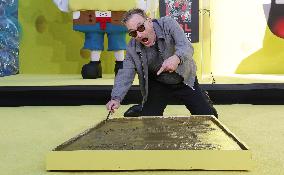 Spongebob Squarepants Places His Hand And Footprints In Cement - LA