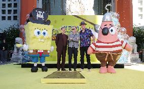 Spongebob Squarepants Places His Hand And Footprints In Cement - LA
