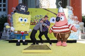 Spongebob Squarepants Places His Hand And Footprints In Cement - LA