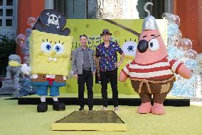 Spongebob Squarepants Places His Hand And Footprints In Cement - LA