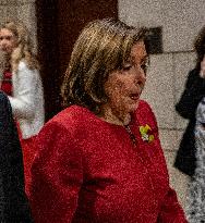 Former House Speaker Nancy Pelosi walks out  after  the  classified briefing